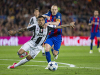 Dani Alves of Juventus FC and Andres Iniesta of FC Barcelona during the UEFA Champions League Quarter Final second leg match between FC Barc...