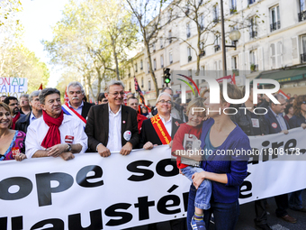 French 'Parti de Gauche' (PG) far-left party's leader, Jean-Luc Melenchon (C), gestures beside French Communist Party's leader Pierre Lauren...