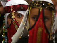 Bedouin girls wears traditional dress during Folklore Exhibition in Gaza city, Palestine,  on April 20, 2017. (