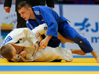 Aleksander Beta (POL, blue), Mykolas Lukosevicius (LTU, white),  compete during the European Judo Championships in Warsaw, April 20, 2017....