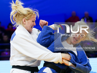 Eva Csernoviczki (HUN, blue), Maryna Cherniak (UKR, white), compete during the European Judo Championships in Warsaw, April 20, 2017. (
