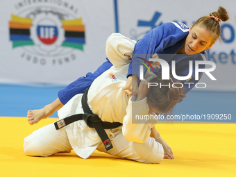 Noa Minsker (ISR, white), Monica  Ungureanu (ROU, blue), compete during the European Judo Championships in Warsaw, April 20, 2017. (