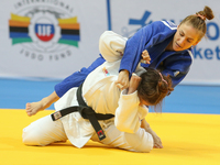 Noa Minsker (ISR, white), Monica  Ungureanu (ROU, blue), compete during the European Judo Championships in Warsaw, April 20, 2017. (