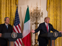 President Trump and Prime Minister Paolo Gentiloni of Italy, held a joint press conference in the East Room of the White House, on Thursday,...
