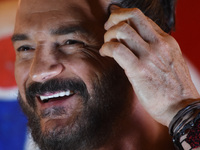 Singer Ricardo Arjona is seen touching the forehead during a press conference to promote the latest album 'Circo Soledad' at Estacion Indian...