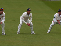 L-R Essex's Simon Harmer, Essex's Tom Westley and Essex's Alastiar Cook during Specsavers County Championship - Division One match between M...