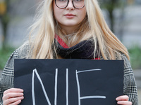 Agata Polcyn, journalist for the countrys second largest newspaper Gazeta Wyborcza and initiator of a rally against domestic abuse by a loca...