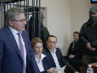 Ukrainian former lawmaker Mykola Martynenko (C), who is under investigation over the suspected embezzlement, is seen during a court hearing...