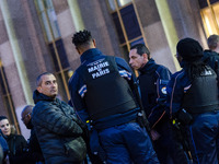 Police protesting in silence to pay their respect in Paris on April 21, 2017, a day after a gunman opened fire on police along the avenue, k...