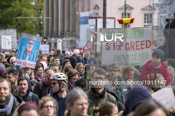 Paople attending the 'March for Science' hold a banners in support to science and research in Berlin, Germany on April 22, 2017. Thousands o...