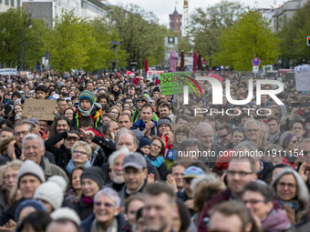 People attending the 'March for Science' gather in front of Brandenburg Gate to express their support to science and research in Berlin, Ger...
