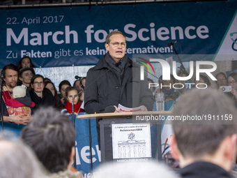 Berlin's Mayor Michael Mueller speaks during the 'March for Science' in front of Brandenburg Gate in Berlin, Germany on April 22, 2017. Thou...