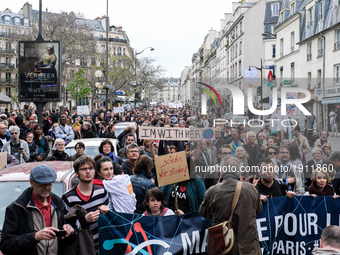 Protesters hold banners during the March for Science in Paris, France, on 22 April 2017.. Scientists, science enthusiasts, and concerned cit...
