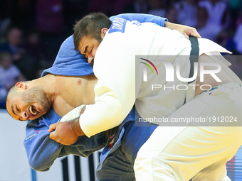 Adam Okruashvili (white) and Guram Tushishvili (blue)fight during the men's over 100kg competition during the European Judo Championship in...
