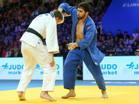 Yahor Varapayeu (BLR, white), Khusen Khalmurzaev (RUS, blue), compete during the European Judo Championship in Warsaw, Poland, on April 21,...