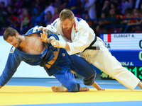Serbian Aleksandar Kukolj (blue) fights with French Axel Clerget (white) during men under 90kg competition during the European Judo Champion...