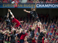 Mako Vanipola and George Kruis of Saracens with Peter O'Mahony of Munster during the European Rugby Champions Cup Semi-Final match between M...