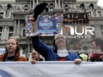 Brian Patrick Mulligan, of Philadelphia, in his role of Ben Franklin is seen at the front of the National March for Science, on Earth Day, A...