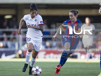  Marie-Laure Delie of Paris Saint Germain defended by  Ruth of FC Barcelona during the semifinals of UEFA Womens Champions League match betw...