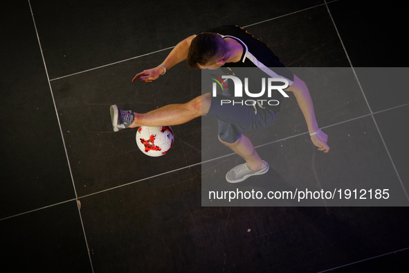 Participants are seen competing in the national freestyle football competition on 22 April, 2017 in the Focus Park shopping mall in Bydgoszc...