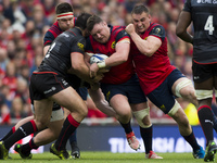 Dave Kilcoyne with the ball and Tommy O'Donnell of Munster battle with Jamie George of Saracens during the European Rugby Champions Cup Semi...