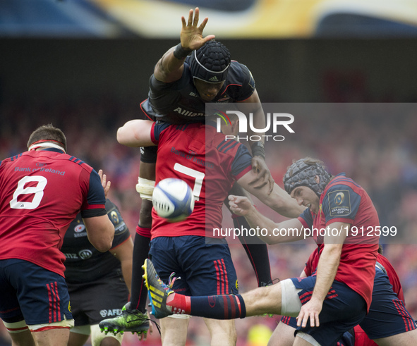 Maro Itoje of Saracens blocks Duncan Williams kick during the European Rugby Champions Cup Semi-Final match between Munster Rugby and Sarace...