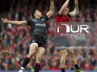 Andrew Conway of Munster with Sean Maitland of Saracens during the European Rugby Champions Cup Semi-Final match between Munster Rugby and S...