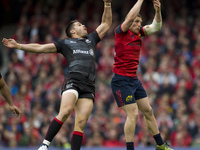 Andrew Conway of Munster with Sean Maitland of Saracens during the European Rugby Champions Cup Semi-Final match between Munster Rugby and S...