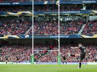 Owen Farrell of Saracens scores a conversion during the European Rugby Champions Cup Semi-Final match between Munster Rugby and Saracens at...