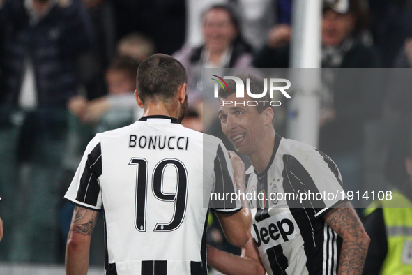 Juventus forward Mario Mandzukic (17) celebrates with Juventus defender Leonardo Bonucci (19) after scoring his goal during the Serie A foot...