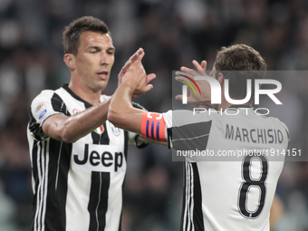 Mario Mandzukic  and Claudio Marchisio during Serie A match between Juventus v Genoa, in Turin, on april 23, 2017 (