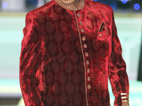 Model wearing an ornate Sherwani suit during the East Meets West Fashion Show held in Mississauga, Ontario, Canada, on April 23, 2017. The s...