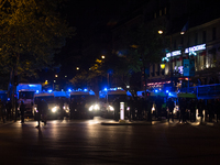 Police Riot closing a main street through place de la République on April 23, 2017. Clashes agains manifestants and police riot were held in...