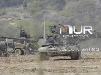 U.S. militaty Tanks take part in an live fire drill near DMZ in Paju, South Korea. President Trump talked to Chinese President Xi Jinping an...