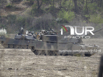 U.S. militaty Tanks take part in an live fire drill near DMZ in Paju, South Korea. President Trump talked to Chinese President Xi Jinping an...