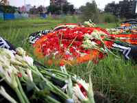 Dhaka, Bangladesh. April 24, 2017. Relatives of Rana plaza victims and social activists pay tribute at a graveyard in Dhaka on April 24, 201...