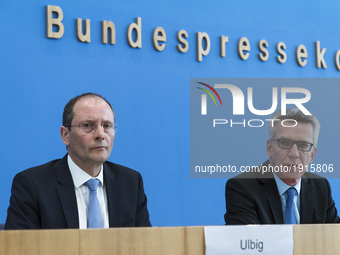 German Interior Minister Thomas de Maiziere (R) and Saxony's Interior Minister Markus Ulbig (L) are pictured during a press conference to pr...
