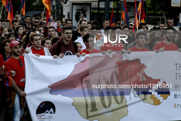 Members of the Armenian youth federation march to the Turkish embassy in central Athens, on Monday April 24, 2017. Hundreds of Armenians who...