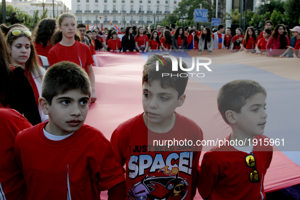 Armenian children carry the Armenian flag, marching to the Turkish embassy in central Athens, on Monday April 24, 2017. Hundreds of Armenian...