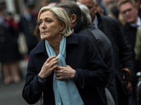 French Presidential Election candidate Marine Le Pen attends the National tribute to fallen French Policeman Xavier Jugele on April 25, 2017...