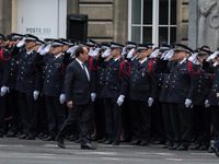 French President Francois Hollande attends the National tribute to fallen French Policeman Xavier Jugele on April 25, 2017 in Paris, France....