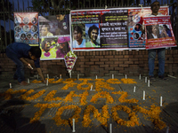 A candle-lit prayer was held in Dhaka, Bangladesh, on 25 April 2017 in remembrance, one year after the gruesome murders of LGBT activists Xu...