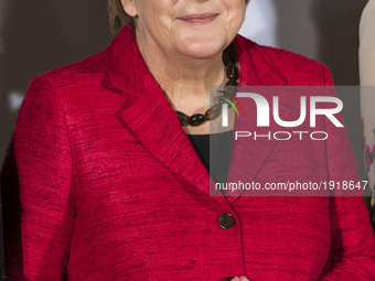 German Chancellor Angela Merkel is pictured as she poses for a family picture during the Woman 20 Summit in Berlin, Germany on April 25, 201...