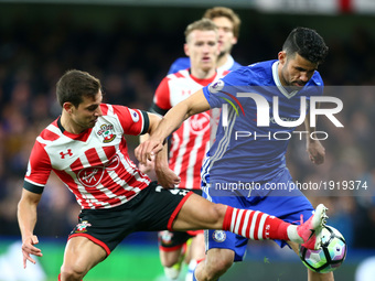 Southampton's Cedric Soares beats Chelsea's Diego Costa during the Premier League match between Chelsea and Southampton at Stamford Bridge,...