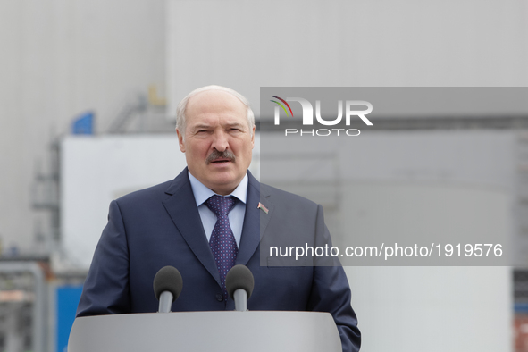 President of Belarus Alexander Lukashenko talks to media in front of the Chornobyl NPP newly raised safe confinement during the meeting to c...
