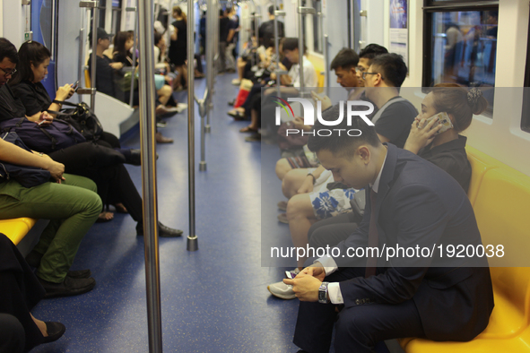 Commuters are useing Bts Sky train  in Bangkok , Thailand on April 26, 2017. 