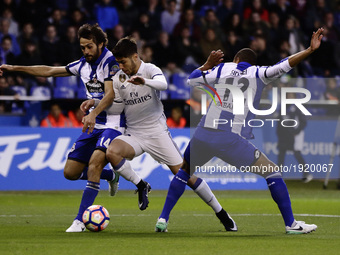  Marco Asensio midfielder of Real Madrid (20) battles for the ball with Alejandro Arribas defender of Deportivo de La Coruña (14) and Sidnei...
