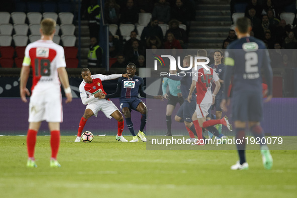 Paris Saint-Germain's French midfielder Blaise Matuidi (C-R) vies with Monaco's French defender Abdou Diallo (C-L) during the French Cup sem...