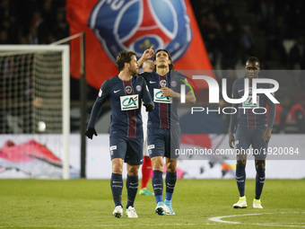 Paris Saint-Germain's Uruguayan forward Edinson Cavani (C) celebrates his goal with Paris Saint-Germain's Brazilian defender Maxwell (L) dur...