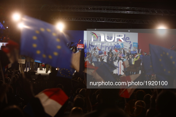 French presidential election candidate for the En Marche ! movement, Emmanuel Macron (C) reacts during a campaign rally in Arras, northern F...